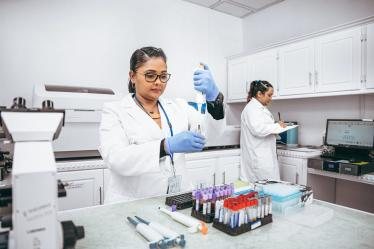 Blood sample tubes being processed at the Tricare laboratory